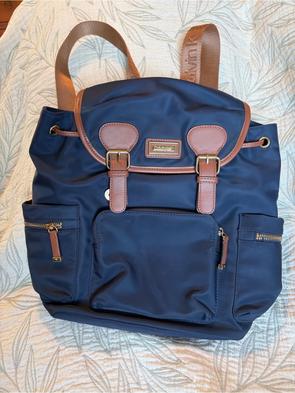 Calvin Klein Navy Backpack with Brown Trim and Gold Hardware